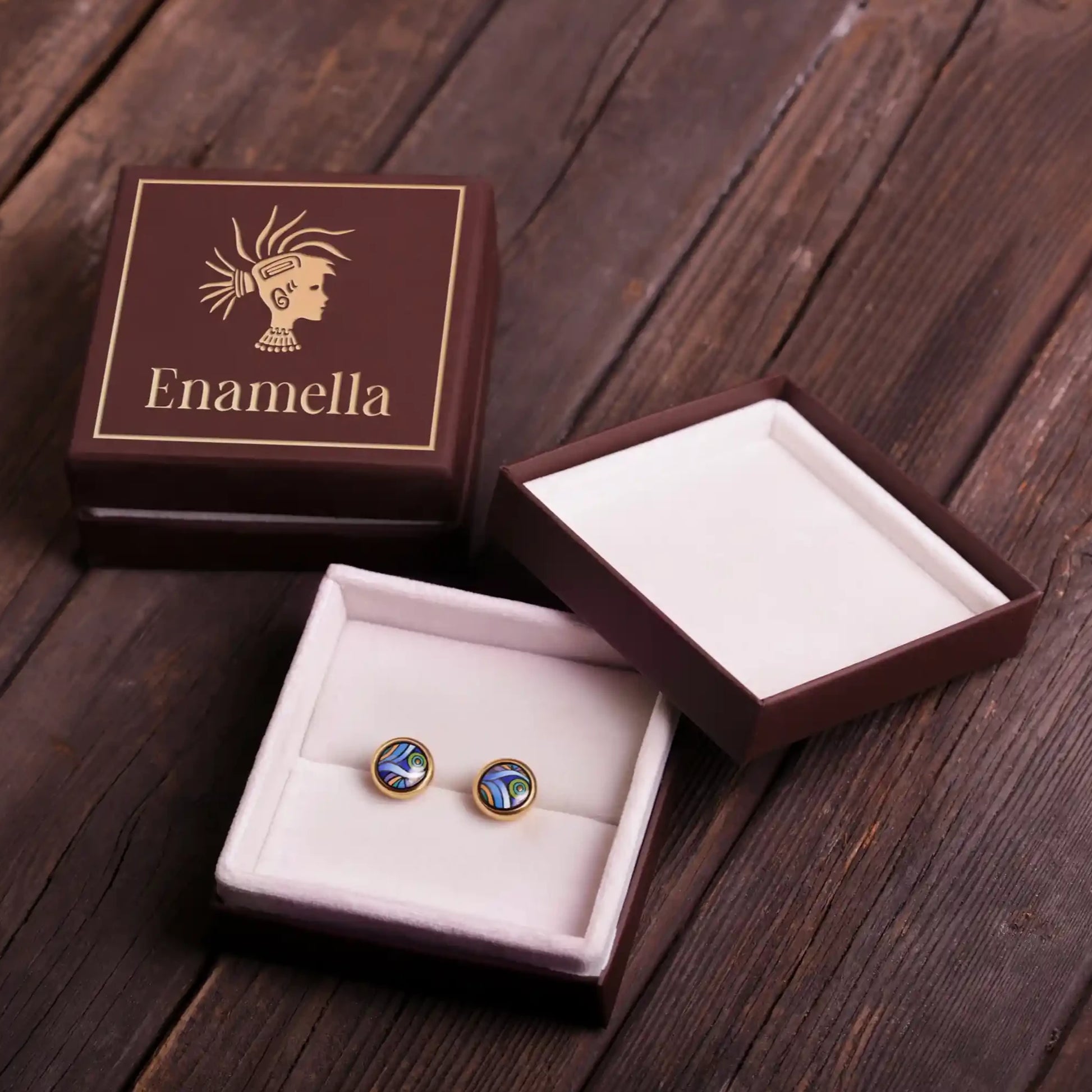 Yellow gold studs with the painting of Van Gogh's "Starry Night". Earrings are placed inside a square box